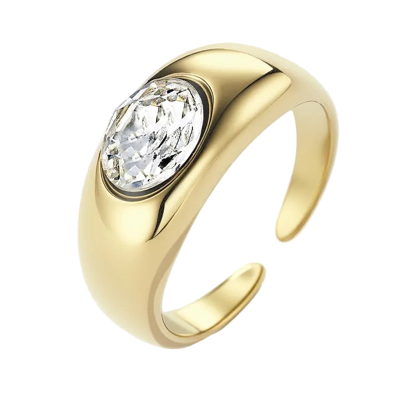Gold ring with a diamond on a light gray background